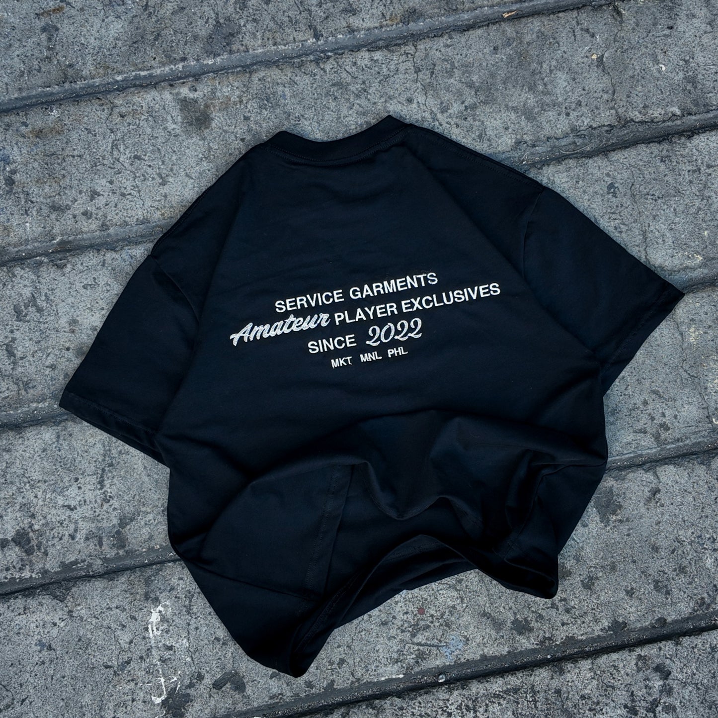 AMATEUR PLAYER EXCLUSIVES SERVICE TEE