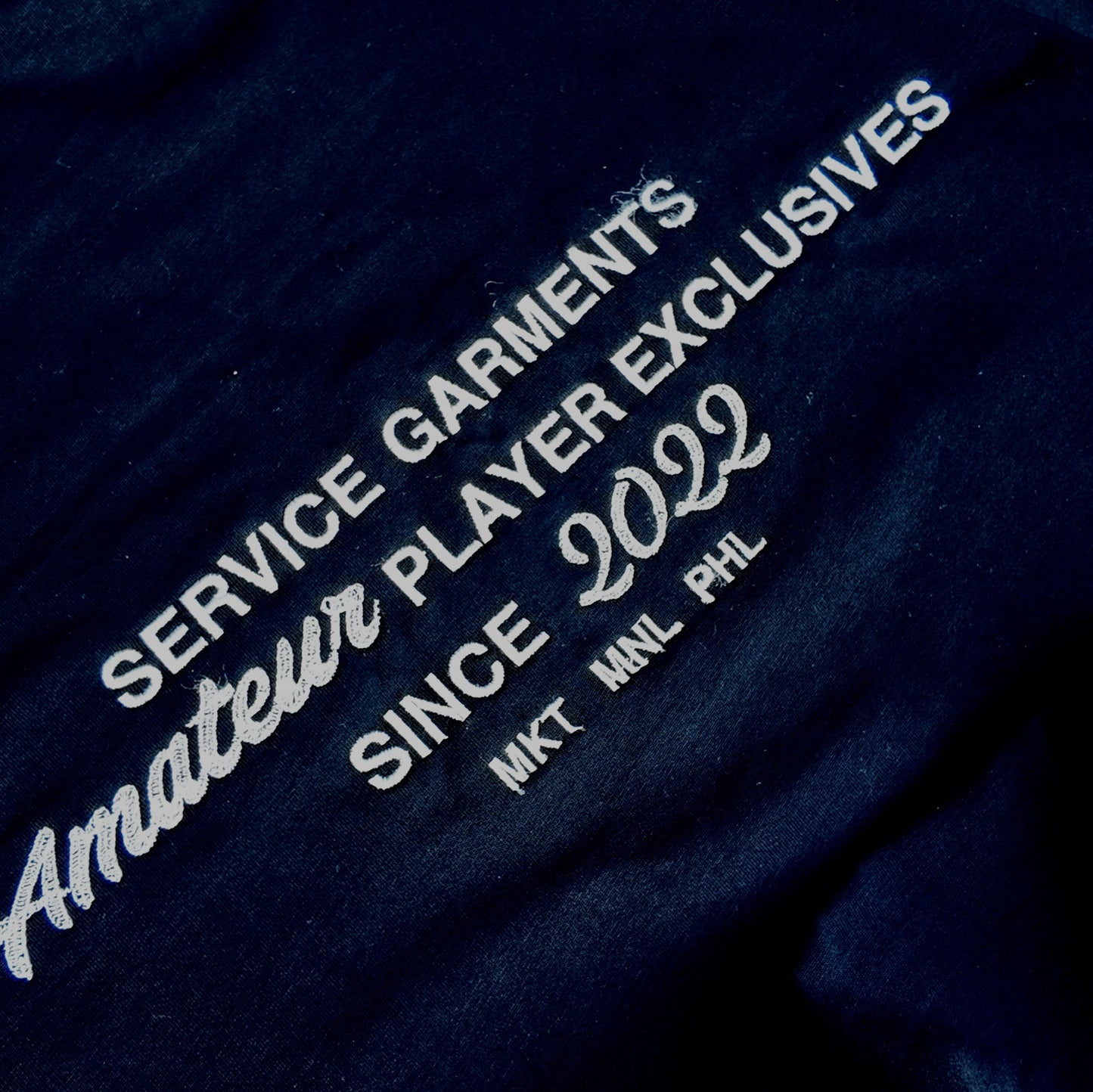 AMATEUR PLAYER EXCLUSIVES SERVICE TEE